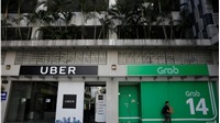 Uber kháng cáo án phạt sát nhập Grab của Singapore