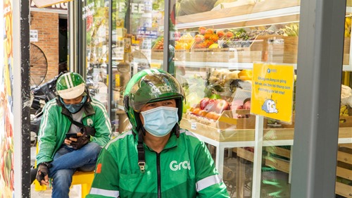 Grab Việt Nam tặng gói bảo hiểm PTI - Vững Tâm hỗ trợ đối tác tài xế Grab trong dịch Covid-19
