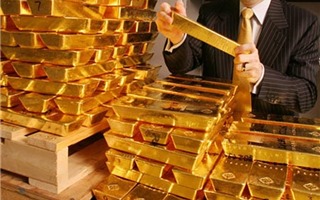 Đồng USD kìm đà tăng giá vàng